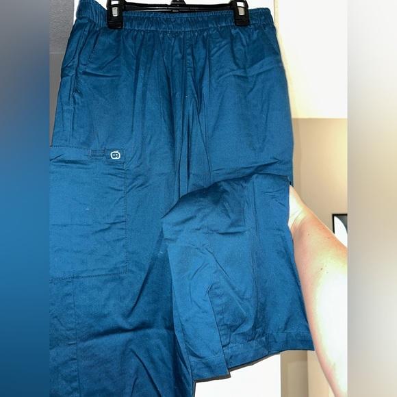 Assorted scrubs - Picture 1 of 13